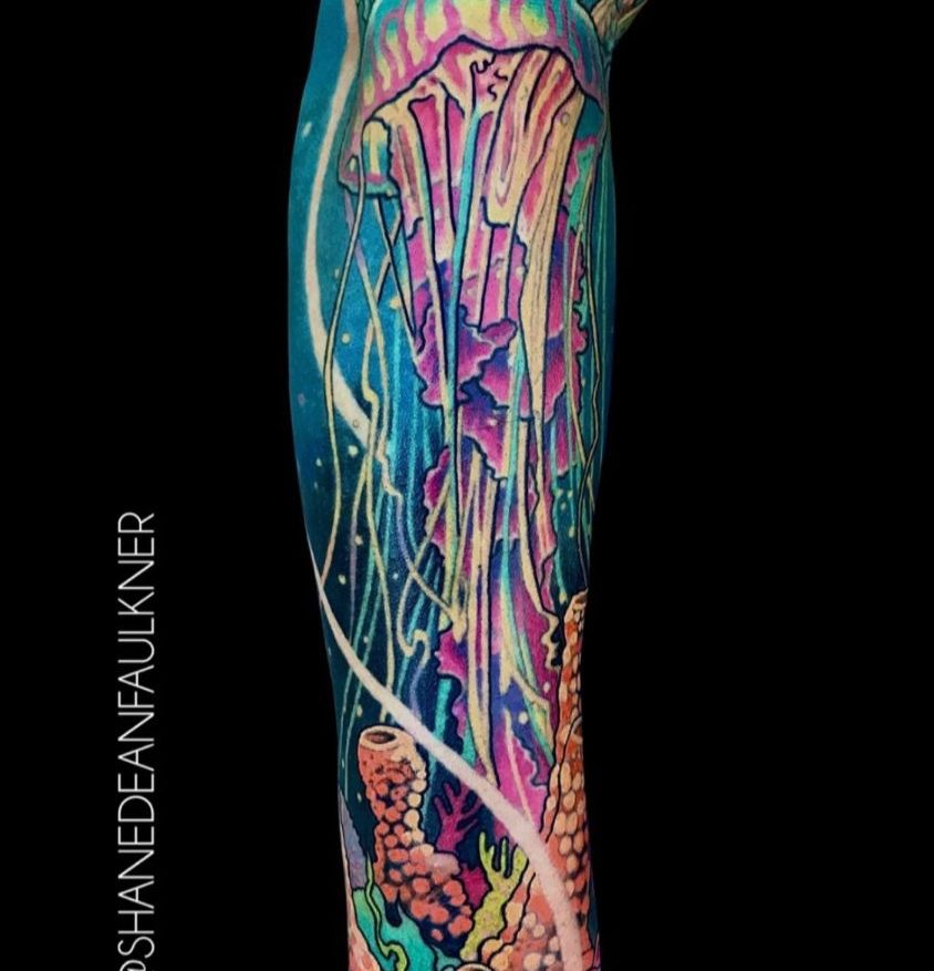 colour tattoo sleeve of a neon jellyfish