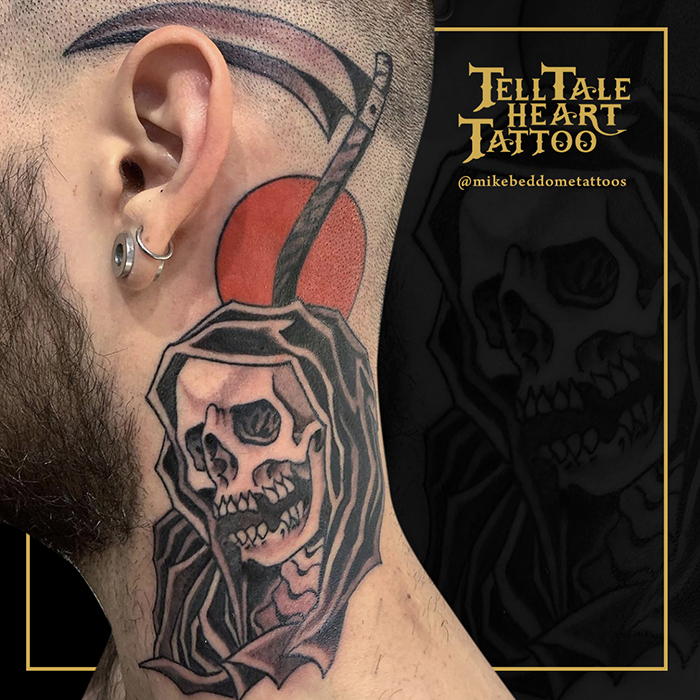 Grim reaper neck tattoo with red sun and scythe going onto head above ear