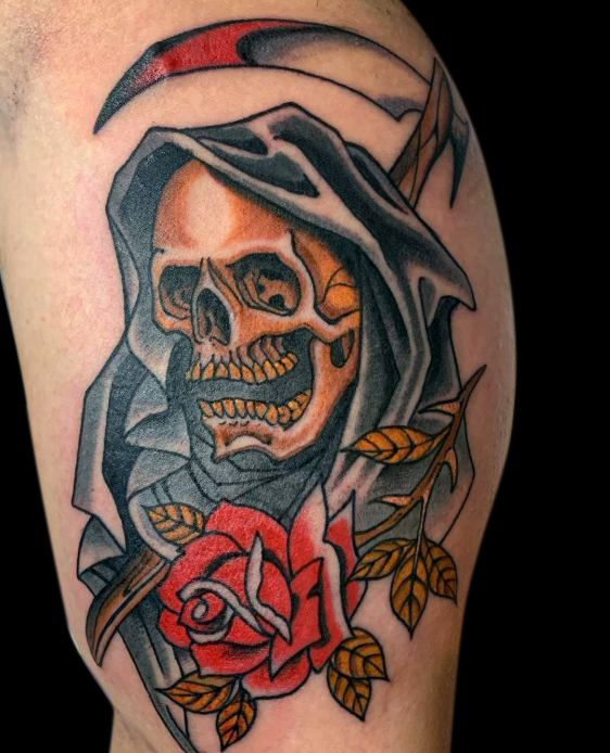 Colour grim reaper tattoo of a hooded skull with a scythe and a single red rose below