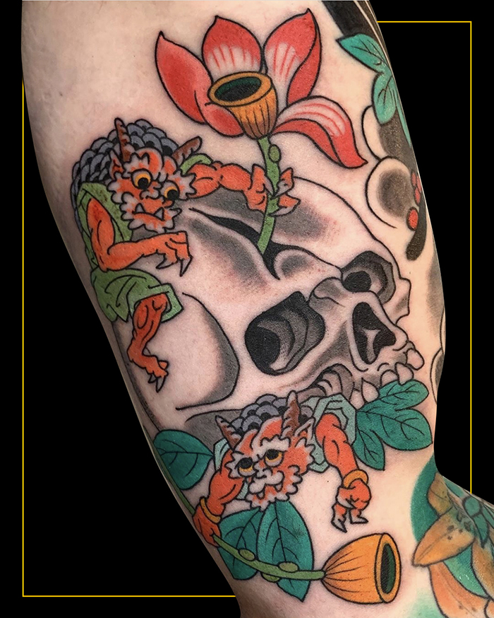 Japanese colour skull with two orange onis and flowers