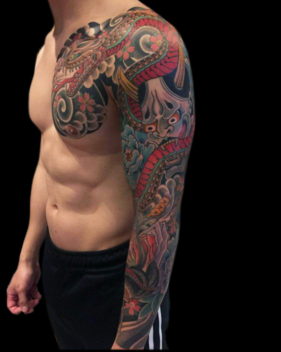 colour Japanese tattoo sleeve on left arm and chest panel featuring a snake, hanya, flowers and wind bars