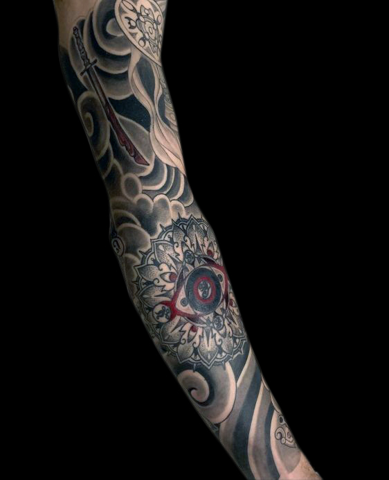 black and grey tattoo sleeve of Japanese wind bars and clouds
