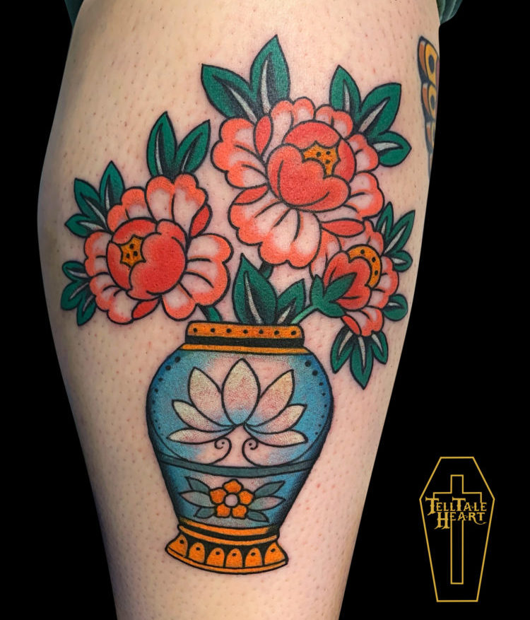 colour tattoo of neotraditional peonies in blue vase