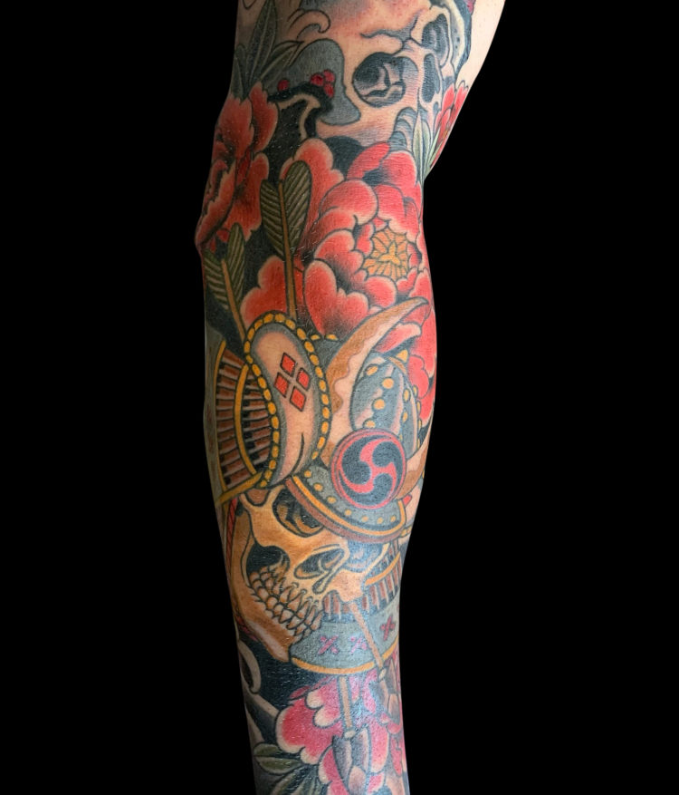 Colour Japanese tattoo sleeve with samurai helmet, skull and flowers